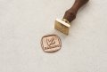 Firkantet laksegl stempel med eget logo