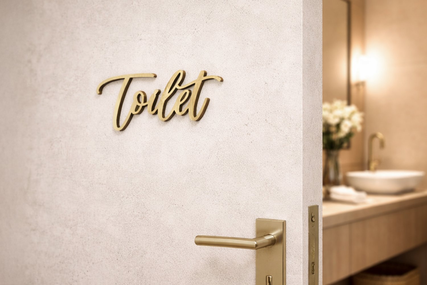Udskåret toiletskilt i guld